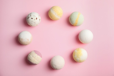 Photo of Flat lay composition with bath bombs and space for text on color background