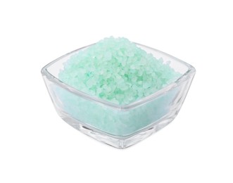 Photo of Glass bowl with turquoise sea salt isolated on white