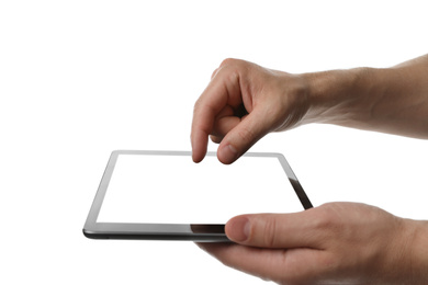 Photo of Man using tablet computer with blank screen on white background, closeup. Modern gadget