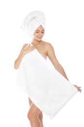 Photo of Portrait of young pretty woman with towels on white background