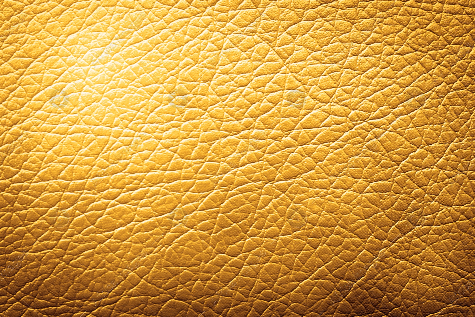 Image of Golden textured surface as background, closeup view