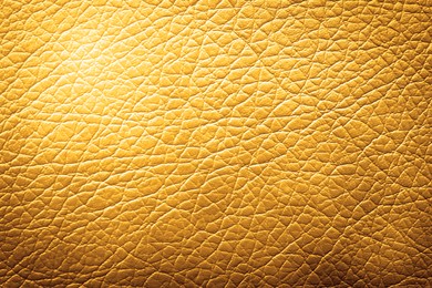 Image of Golden textured surface as background, closeup view