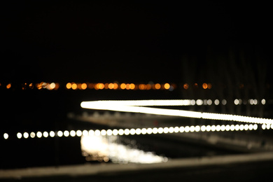 Photo of Blurred view of night city. Bokeh effect