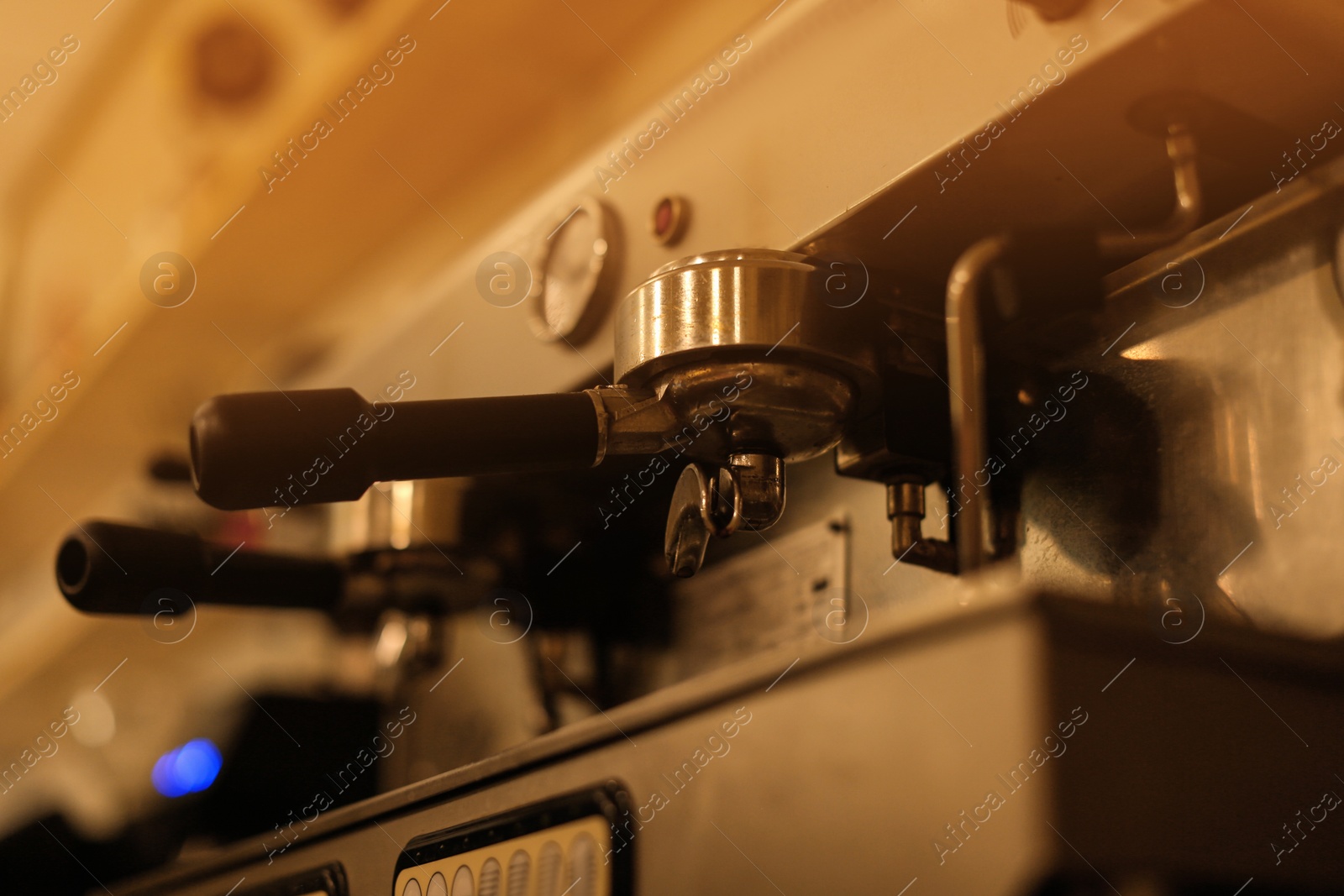 Photo of Professional coffee machine with new portafilter, closeup