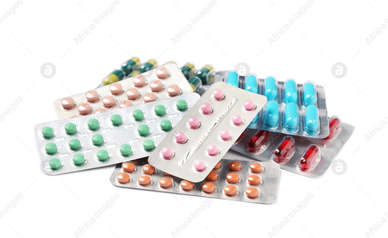 Photo of Blisters with different pills on white background