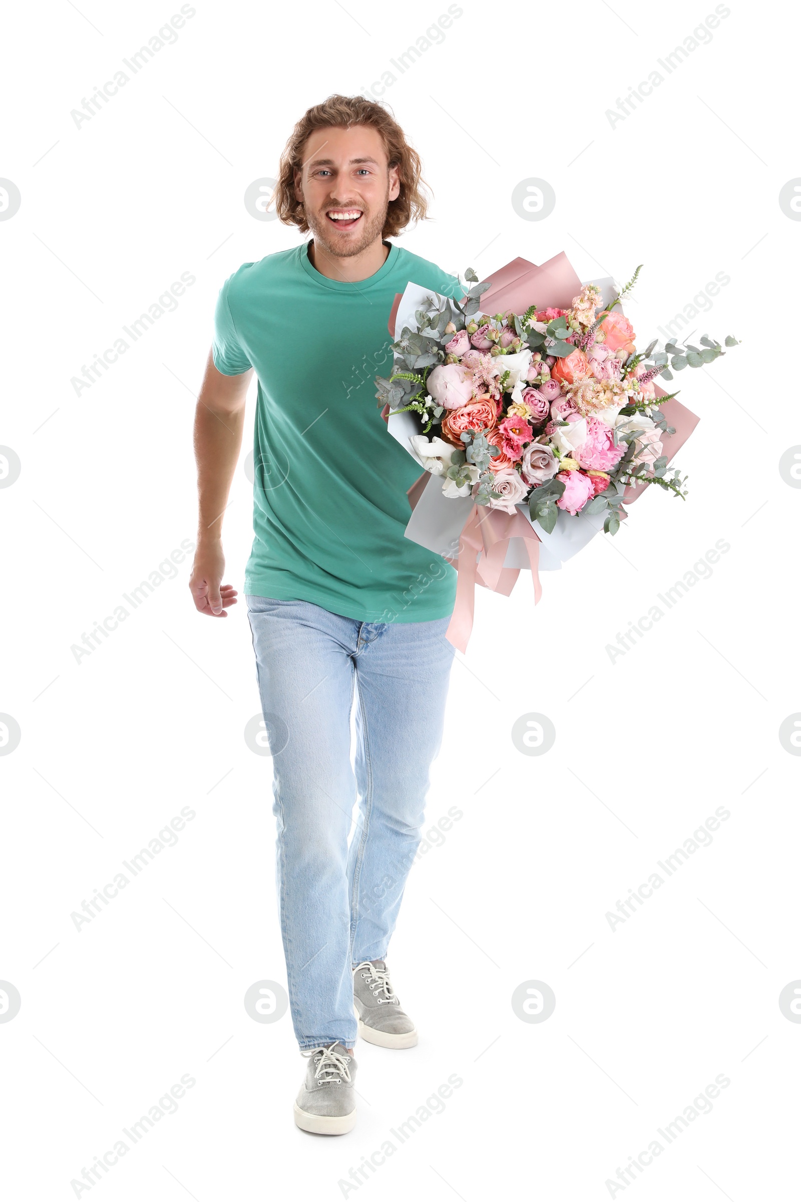 Photo of Young handsome man with beautiful flower bouquet on white background