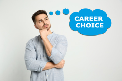 Image of Man thinking about career choice on white background
