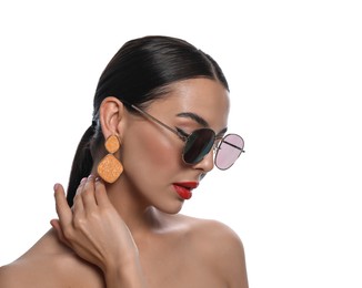 Photo of Attractive woman in fashionable sunglasses against white background