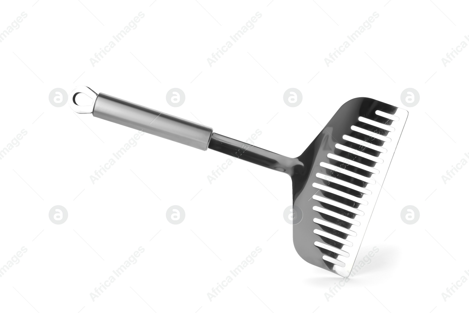 Photo of Stainless steel slotted spatula on white background. Kitchen utensils