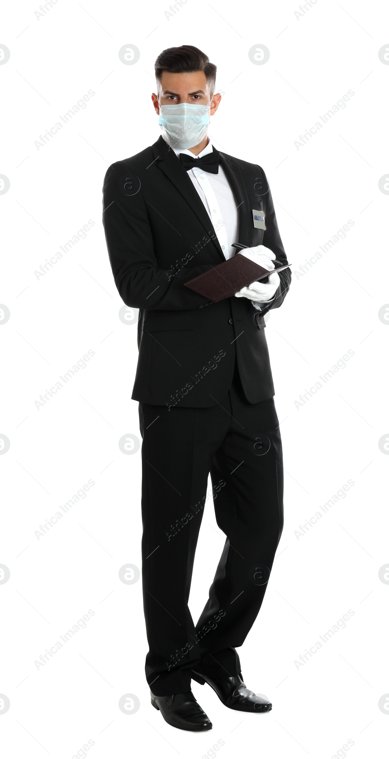 Photo of Waiter in medical face mask taking order on white background