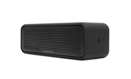 Photo of One black portable bluetooth speaker isolated on white. Audio equipment