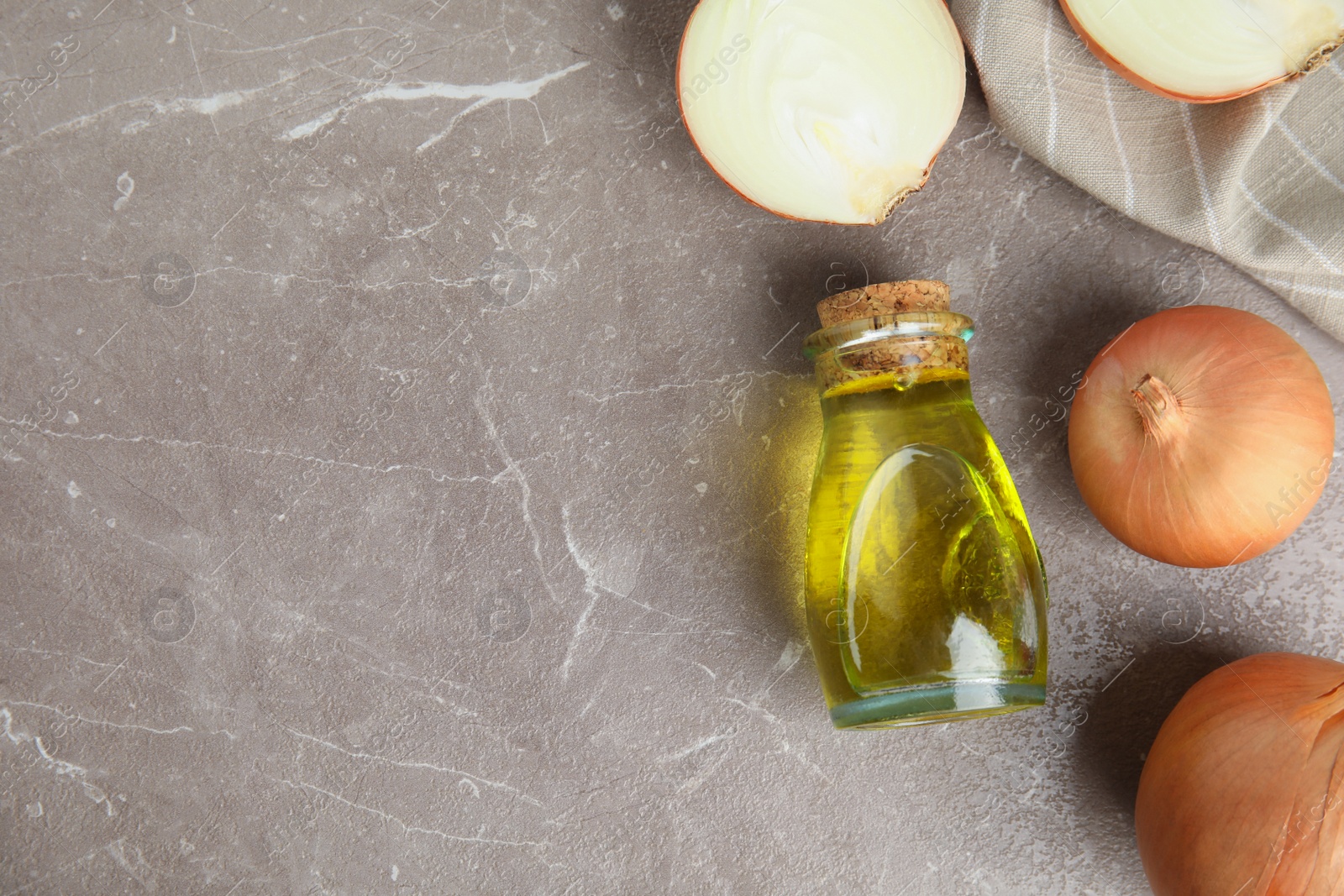 Photo of Flat lay composition with onion syrup and space for text on table