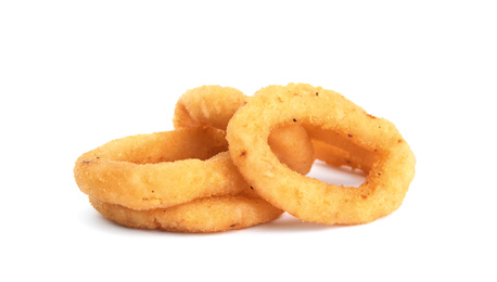 Delicious golden onion rings isolated on white