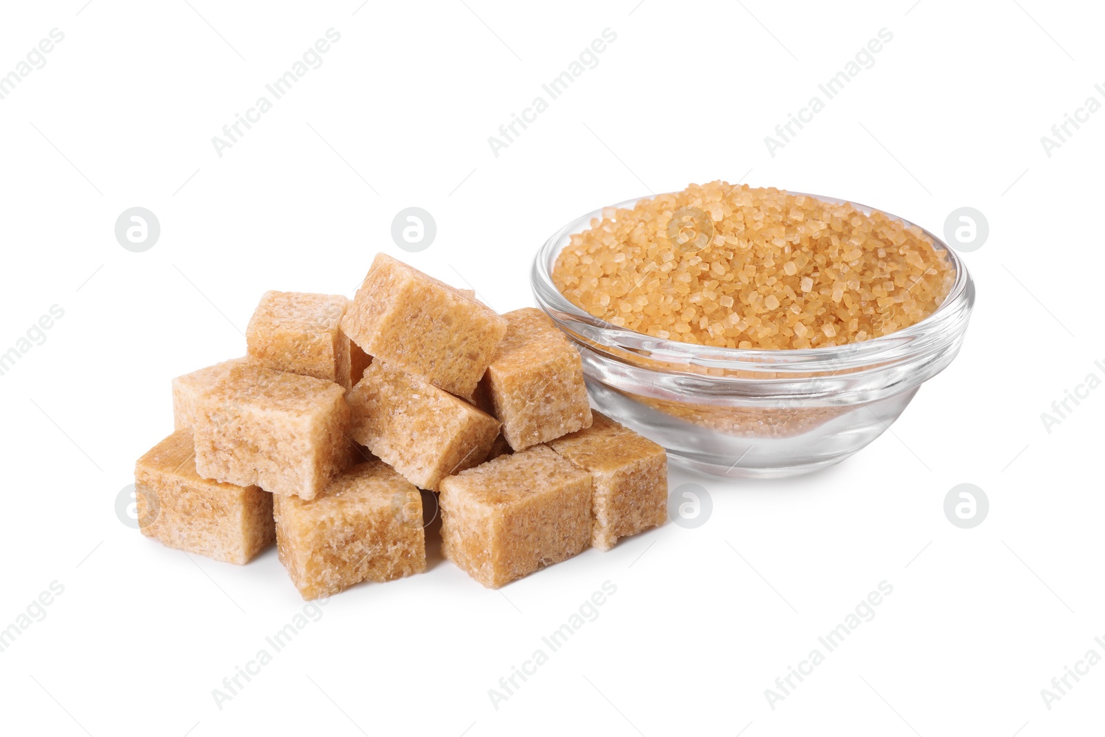 Photo of Different types of brown sugar and bowl isolated on white