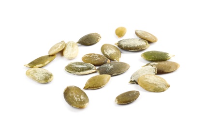 Photo of Raw peeled pumpkin seeds on white background