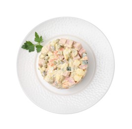 Tasty Olivier salad with boiled sausage isolated on white, top view