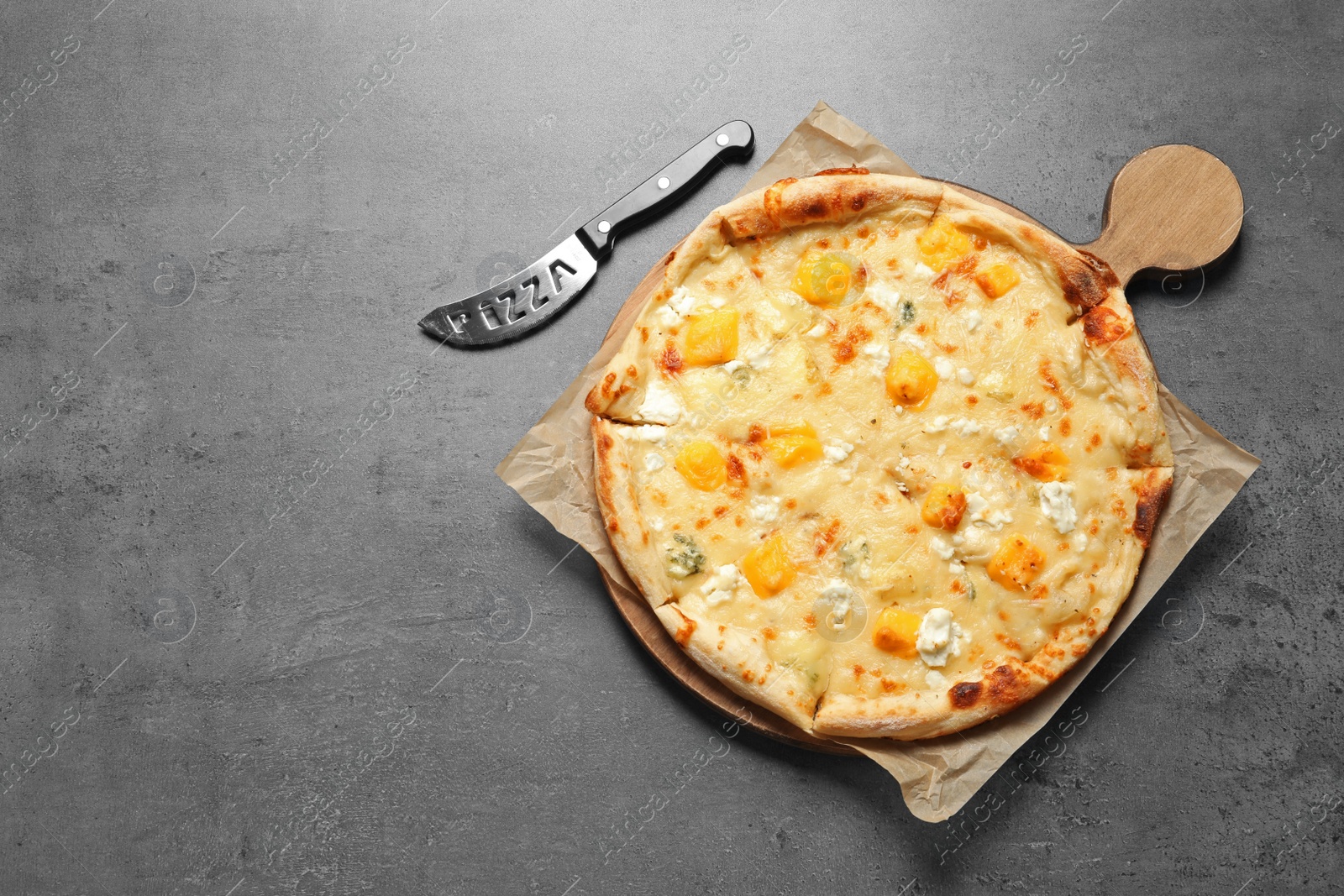 Photo of Hot cheese pizza Margherita on grey background, top view. Space for text