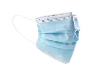 Photo of Disposable face mask isolated on white. Protective measures during coronavirus quarantine
