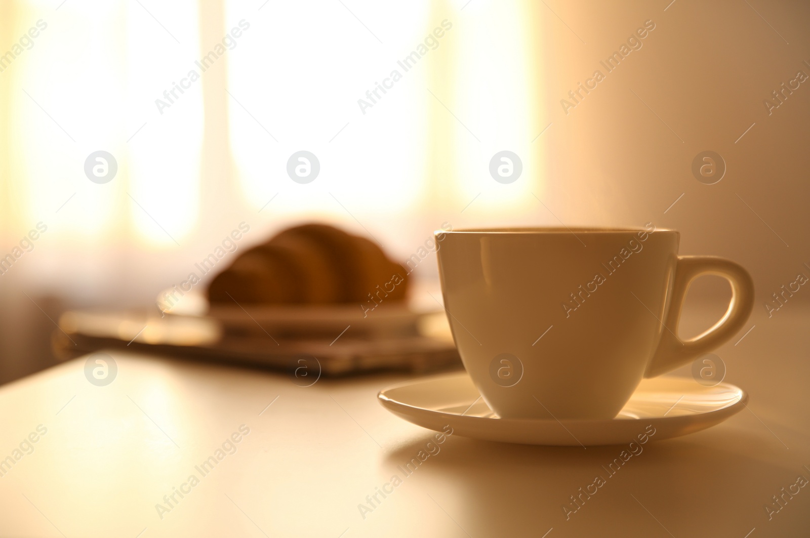 Photo of Cup of hot drink on table, space for text. Lazy morning