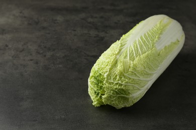 Fresh ripe Chinese cabbage on grey table, space for text