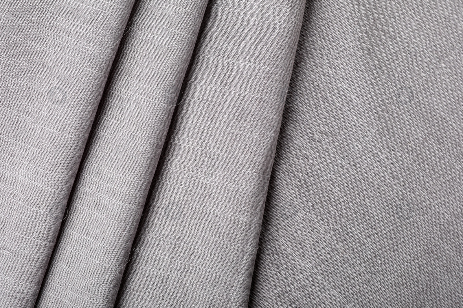 Photo of Grey hemp cloth as background, top view. Natural fabric