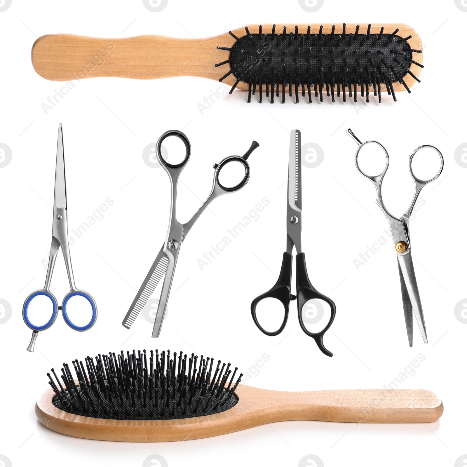 Image of Set of different professional hairdresser scissors and wooden brushes on white background 