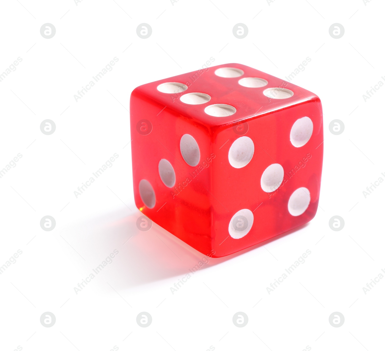 Photo of One red game dice isolated on white