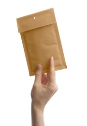 Woman holding kraft paper envelope on white background, closeup