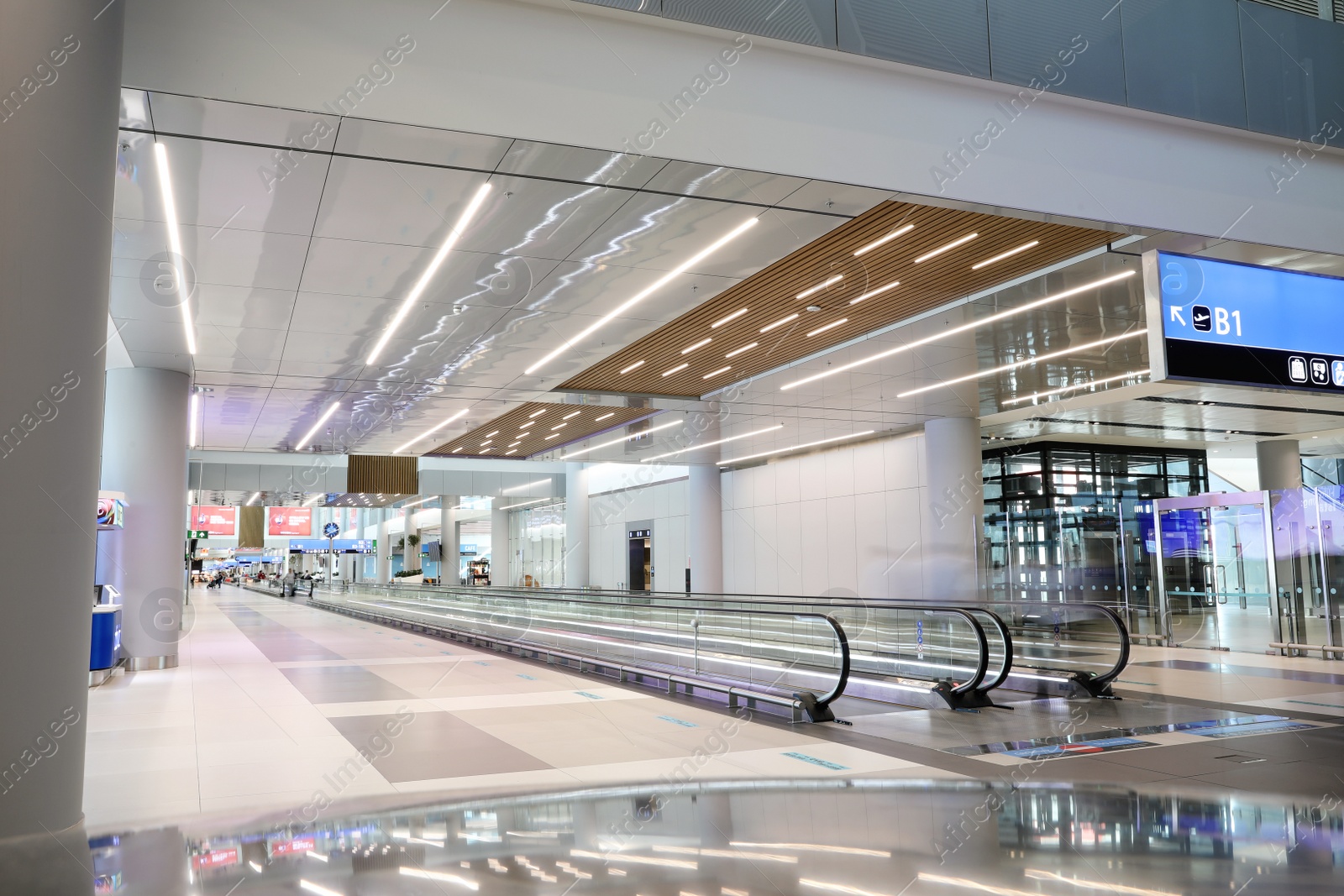 Photo of ISTANBUL, TURKEY - AUGUST 13, 2019: Interior of new airport terminal with moving walkway