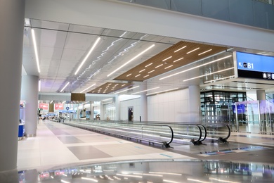 ISTANBUL, TURKEY - AUGUST 13, 2019: Interior of new airport terminal with moving walkway