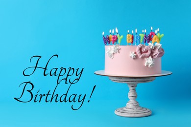 Happy Birthday! Delicious cake with burning candles on light blue background
