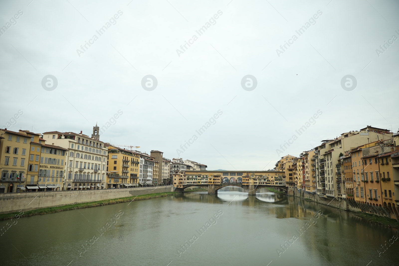 Photo of Florence, Italy - February 8, 2024: Picturesque view of city with beautiful buildings and river