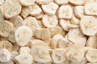 Photo of Closeupfreeze dried bananas as background, top view