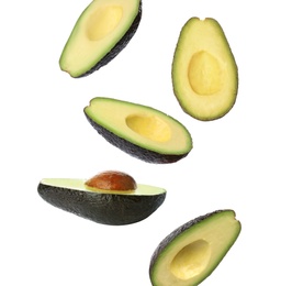 Image of Falling fresh ripe avocados on white background