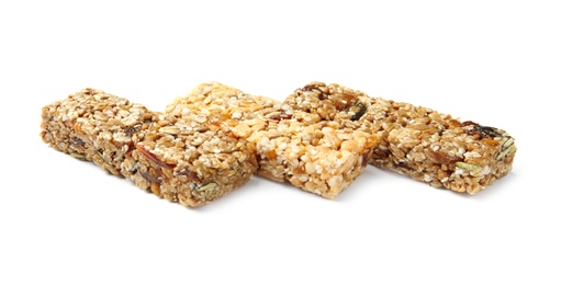 Different grain cereal bars on white background. Healthy snack