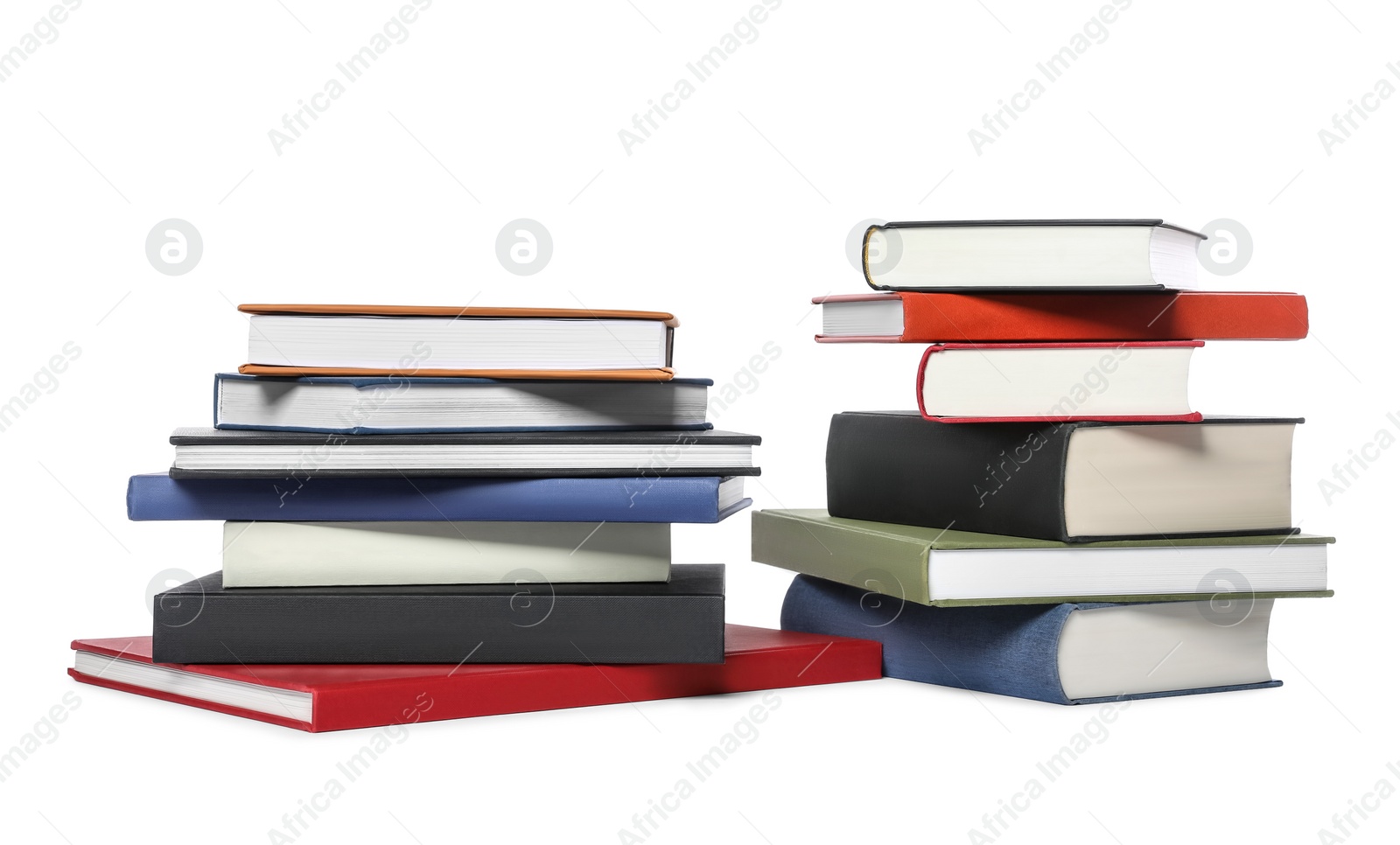 Photo of Many different hardcover books on white background