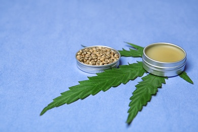 Composition with hemp lotion and space for text on color background