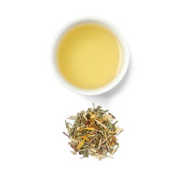 Photo of Freshly brewed tea and dry leaves on white background, top view