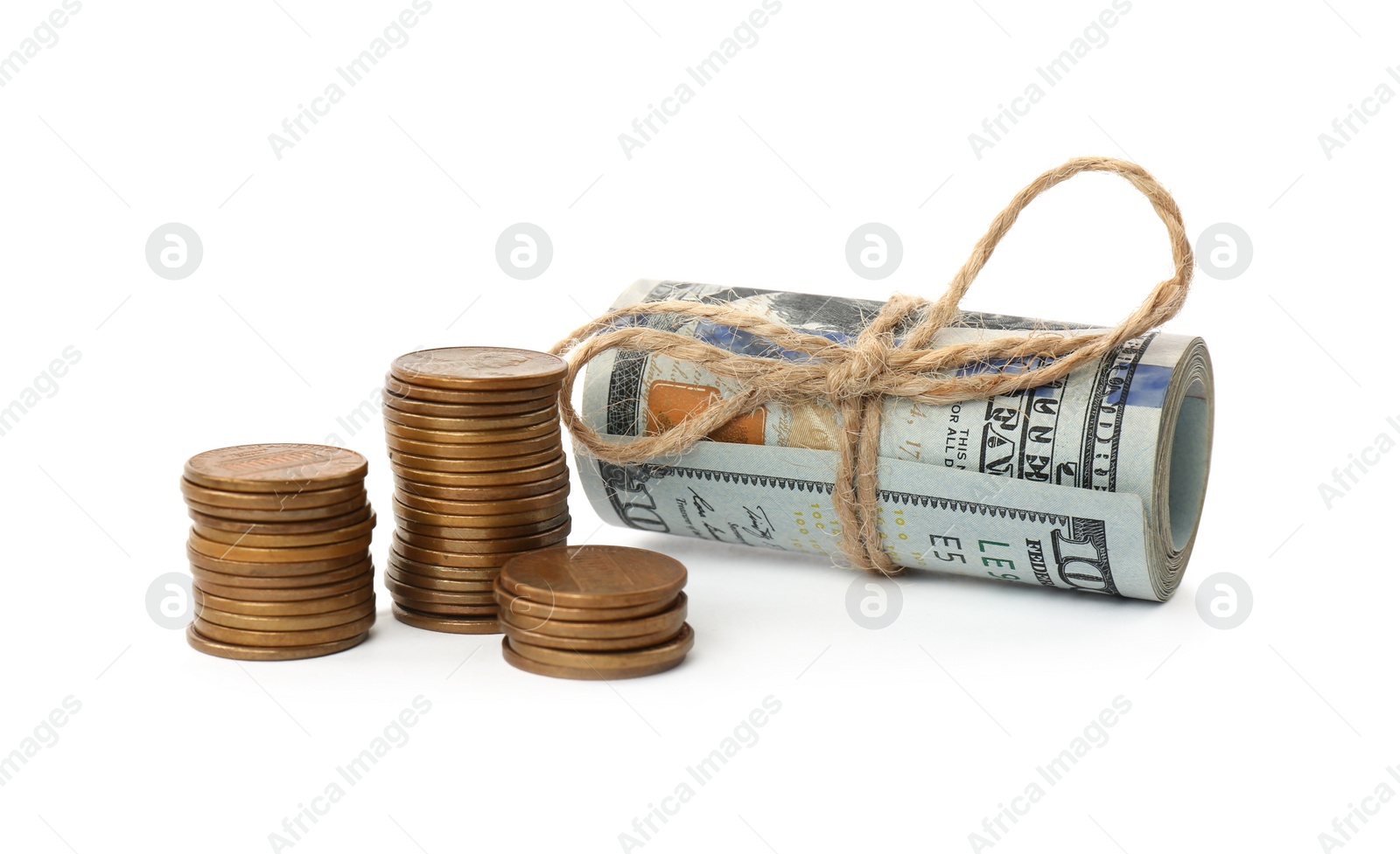 Photo of Roll of dollar bills tied with rope and coins isolated on white