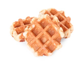 Photo of Many delicious Belgian waffles isolated on white