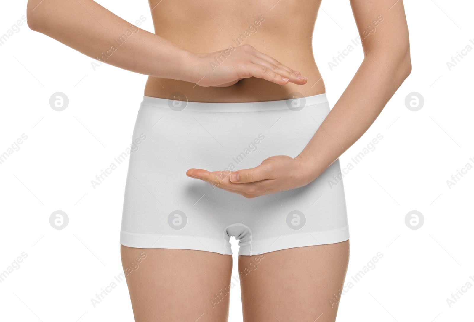 Photo of Woman holding something on white background, closeup. Women's health