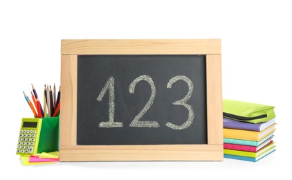 Photo of Different school stationery and small chalkboard on white background