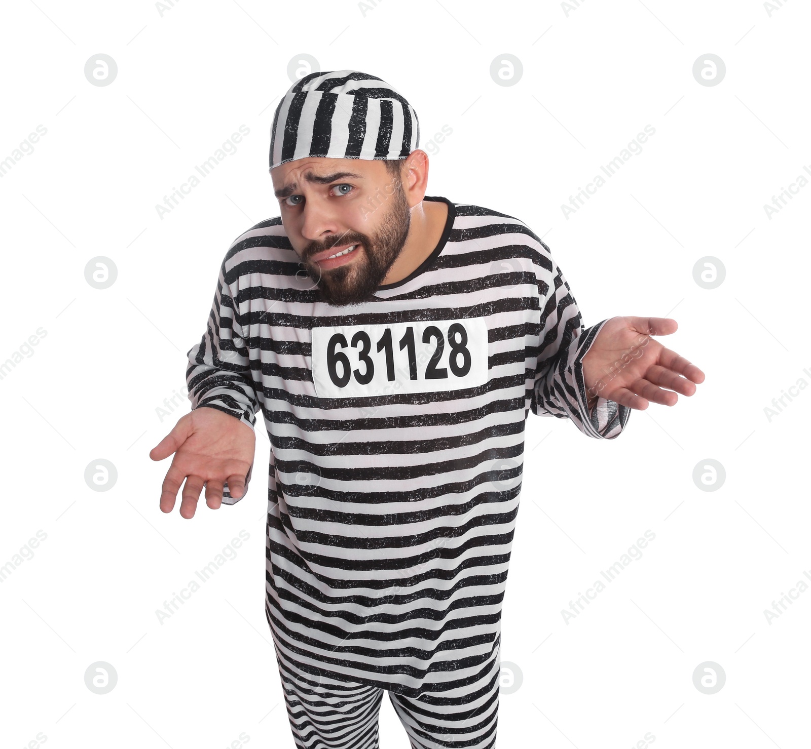 Photo of Prisoner in special uniform perplexedly shrugging his shoulders on white background