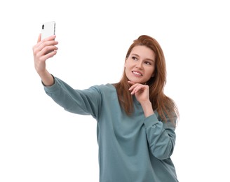 Photo of Beautiful woman taking selfie on white background