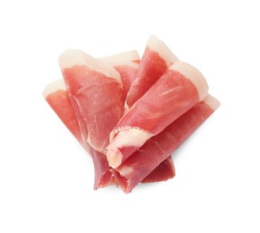 Slices of delicious jamon on white background, top view