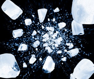 Image of Crushed ice in air on black background