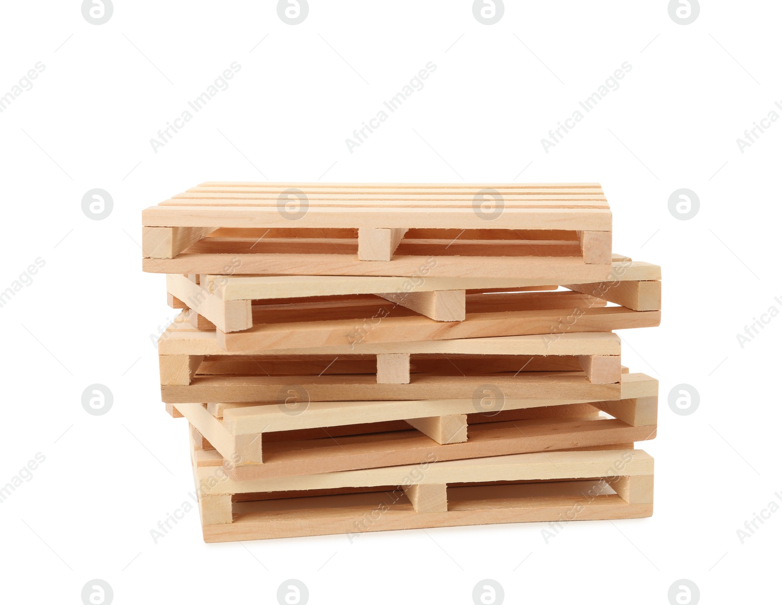 Photo of Stack of small wooden pallets on white background