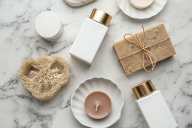 Photo of Flat lay composition with spa supplies on marble table