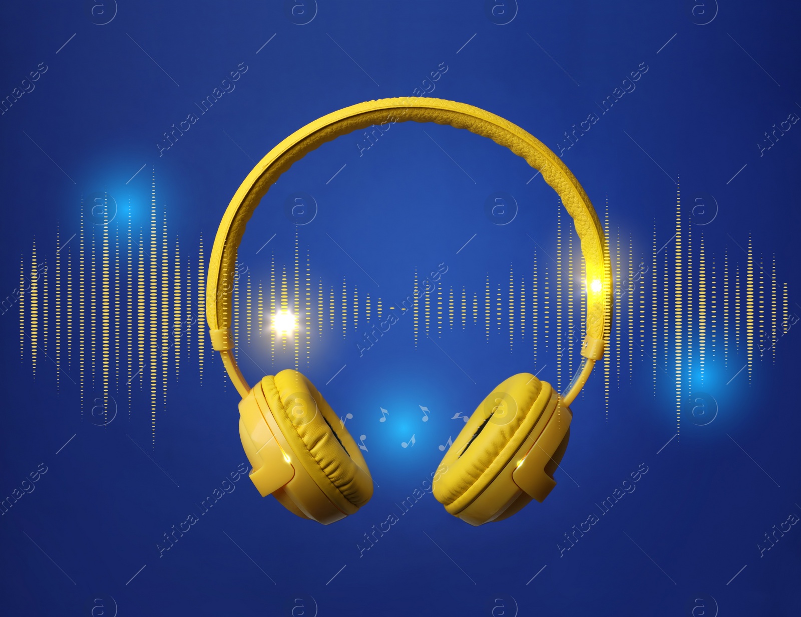 Image of Modern yellow headphones and illustration of dynamic sound waves on blue background