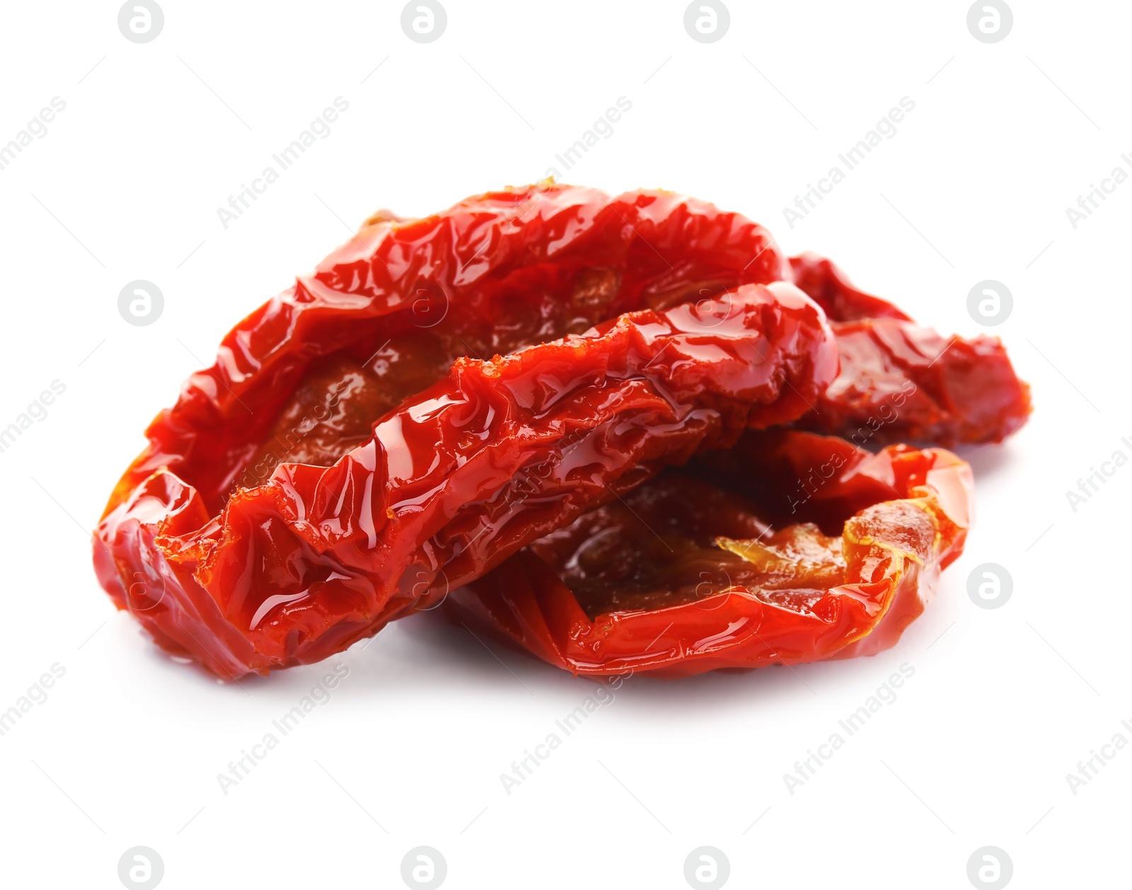 Photo of Tasty sun dried tomatoes on white background